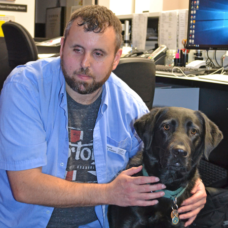 Danny with his guide dog